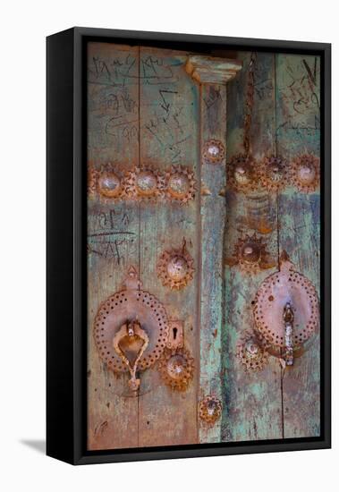 Male and female door knockers give different sounds to ensure right gender answers, Abyaneh, Iran-James Strachan-Framed Premier Image Canvas