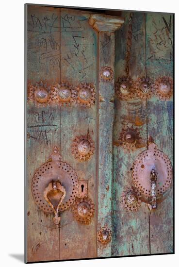 Male and female door knockers give different sounds to ensure right gender answers, Abyaneh, Iran-James Strachan-Mounted Photographic Print