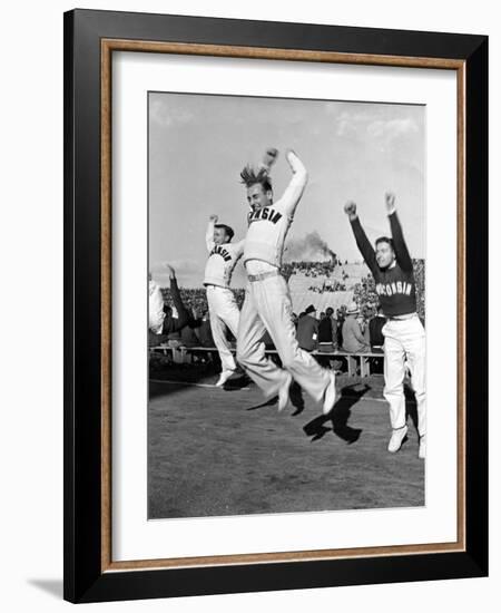 Male Cheerleaders in Action at Wisconsin-Marquette Football Game-Alfred Eisenstaedt-Framed Photographic Print