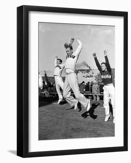 Male Cheerleaders in Action at Wisconsin-Marquette Football Game-Alfred Eisenstaedt-Framed Photographic Print
