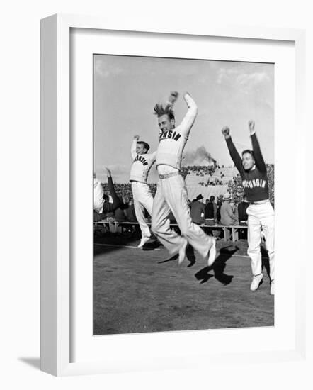 Male Cheerleaders in Action at Wisconsin-Marquette Football Game-Alfred Eisenstaedt-Framed Photographic Print