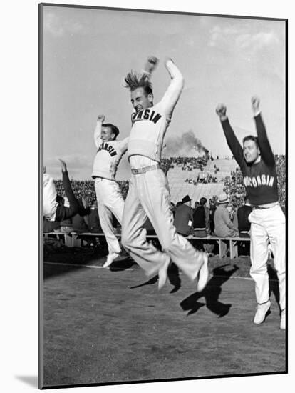 Male Cheerleaders in Action at Wisconsin-Marquette Football Game-Alfred Eisenstaedt-Mounted Photographic Print