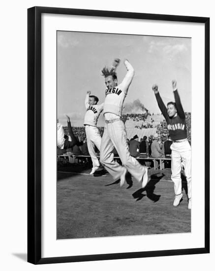 Male Cheerleaders in Action at Wisconsin-Marquette Football Game-Alfred Eisenstaedt-Framed Photographic Print