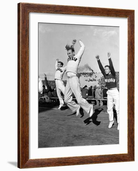 Male Cheerleaders in Action at Wisconsin-Marquette Football Game-Alfred Eisenstaedt-Framed Photographic Print