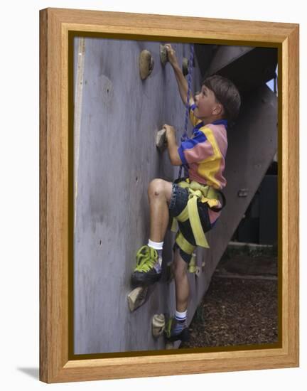 Male Child Wall Climbing Indoors-null-Framed Premier Image Canvas