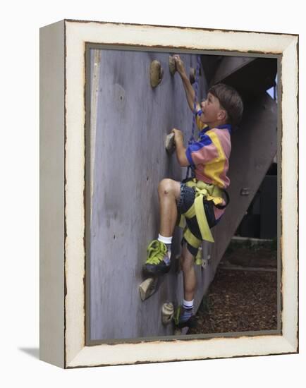 Male Child Wall Climbing Indoors-null-Framed Premier Image Canvas