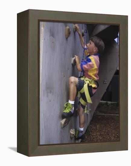 Male Child Wall Climbing Indoors-null-Framed Premier Image Canvas