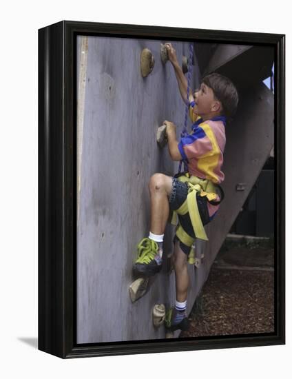 Male Child Wall Climbing Indoors-null-Framed Premier Image Canvas