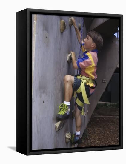 Male Child Wall Climbing Indoors-null-Framed Premier Image Canvas