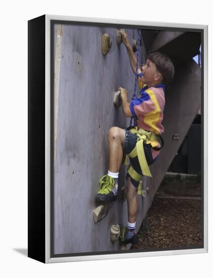 Male Child Wall Climbing Indoors-null-Framed Premier Image Canvas