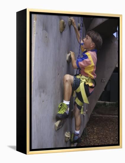 Male Child Wall Climbing Indoors-null-Framed Premier Image Canvas