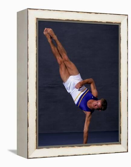 Male Gymnast Performing on the Floor Exercise-null-Framed Premier Image Canvas
