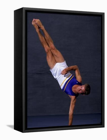 Male Gymnast Performing on the Floor Exercise-null-Framed Premier Image Canvas