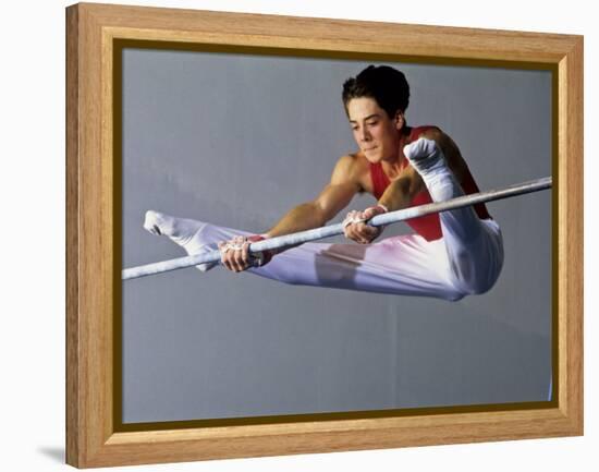 Male Gymnast Performing on the Horizontal Bar-null-Framed Premier Image Canvas