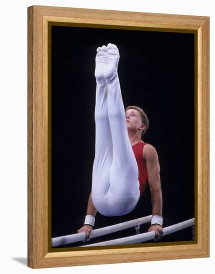 Male Gymnast Performing on the Parallel Bars-null-Framed Premier Image Canvas