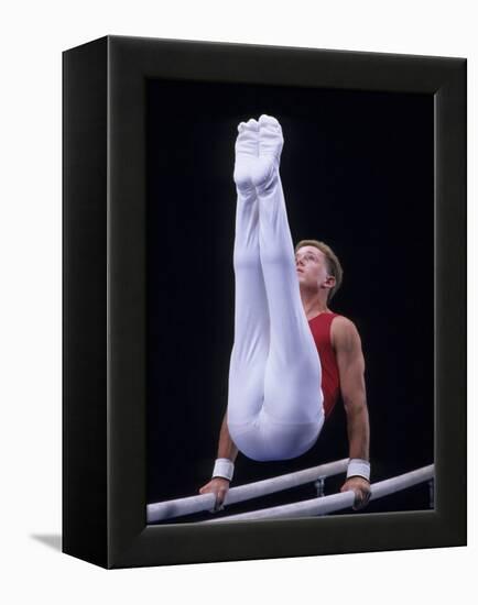 Male Gymnast Performing on the Parallel Bars-null-Framed Premier Image Canvas