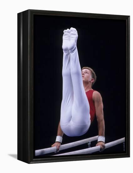 Male Gymnast Performing on the Parallel Bars-null-Framed Premier Image Canvas