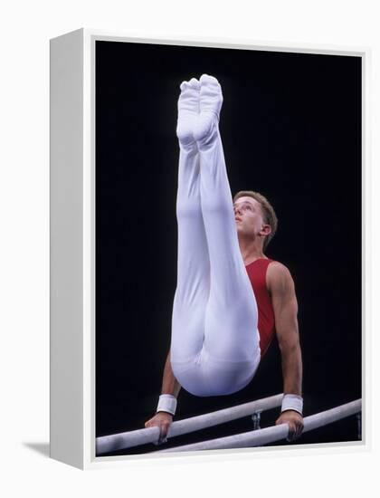 Male Gymnast Performing on the Parallel Bars-null-Framed Premier Image Canvas