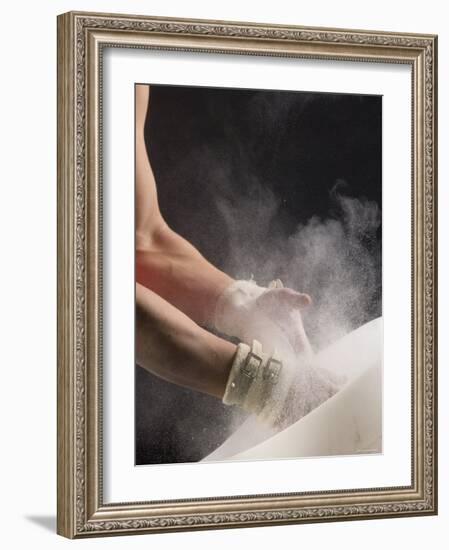 Male Gymnast Putting Chalk on his Hands, Bainbridge Island, Washington State, USA-null-Framed Photographic Print