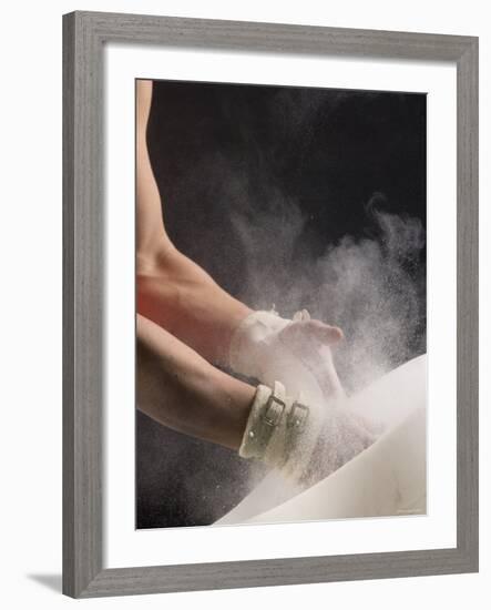 Male Gymnast Putting Chalk on his Hands, Bainbridge Island, Washington State, USA-null-Framed Photographic Print