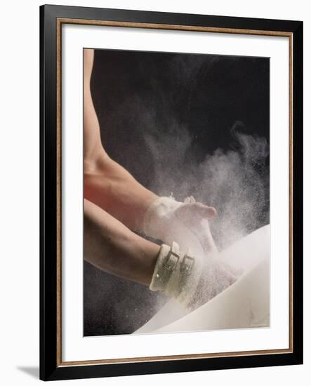 Male Gymnast Putting Chalk on his Hands, Bainbridge Island, Washington State, USA-null-Framed Photographic Print