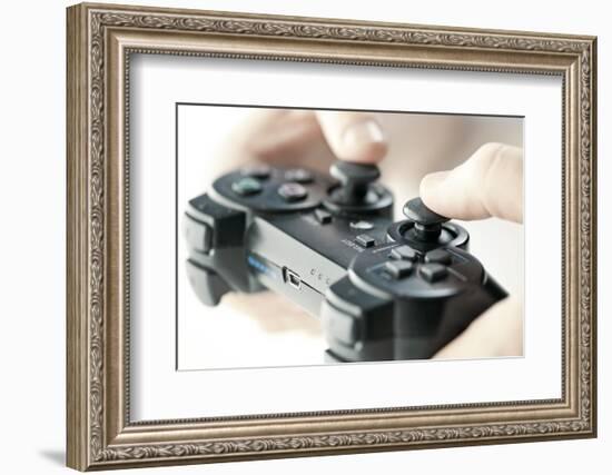 Male Hands Holding Video Game Controller Closeup-elenathewise-Framed Photographic Print