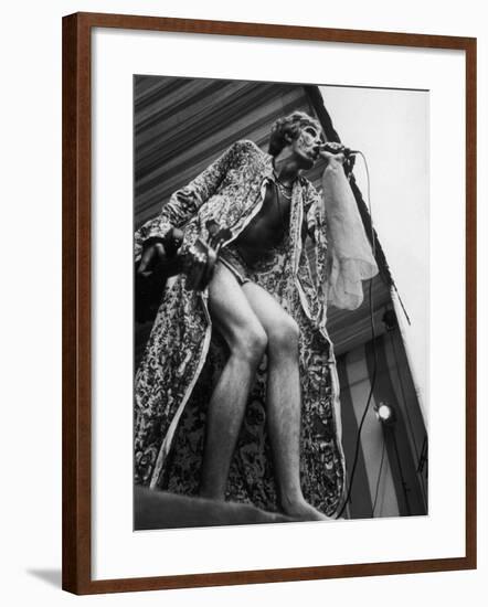 Male Hippy on Stage-null-Framed Photographic Print