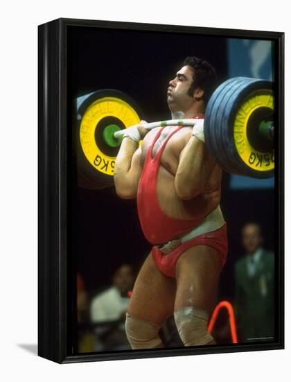 Male Lifting Heavy Weights in Competition at the Olympics-John Dominis-Framed Premier Image Canvas