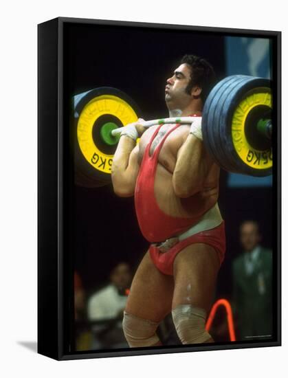 Male Lifting Heavy Weights in Competition at the Olympics-John Dominis-Framed Premier Image Canvas