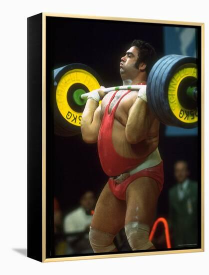 Male Lifting Heavy Weights in Competition at the Olympics-John Dominis-Framed Premier Image Canvas