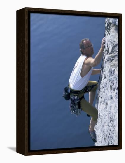 Male Rock Climber Reaching for a Grip-null-Framed Premier Image Canvas