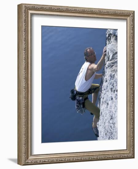 Male Rock Climber Reaching for a Grip-null-Framed Photographic Print