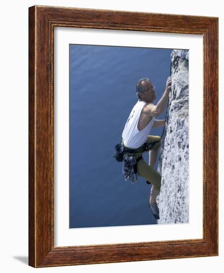 Male Rock Climber Reaching for a Grip-null-Framed Photographic Print