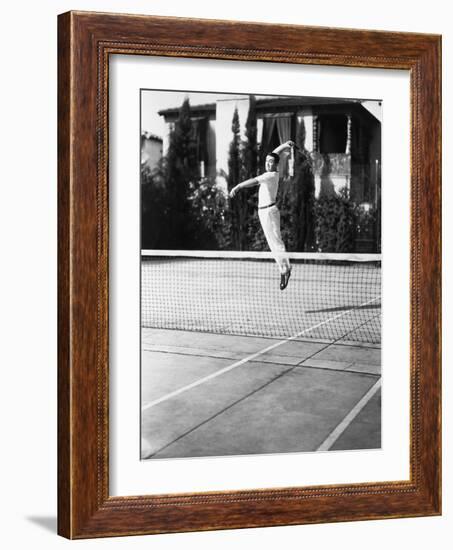 Male Tennis Player Jumping for Shot-null-Framed Photo