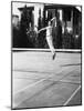 Male Tennis Player Jumping for Shot-null-Mounted Photo