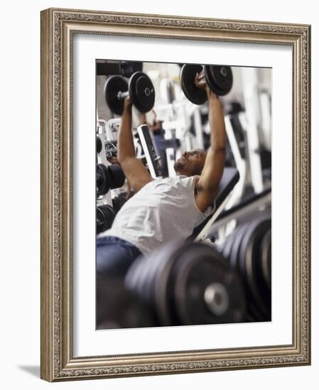 Male Working Out with Weights in a Health Club, Rutland, Vermont, USA-Chris Trotman-Framed Photographic Print