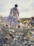 A Woman in a White Victorian Dress, Walking Among Camomile Flowers on a Meadow on a Sunny Day-Malgorzata Maj-Framed Premier Image Canvas