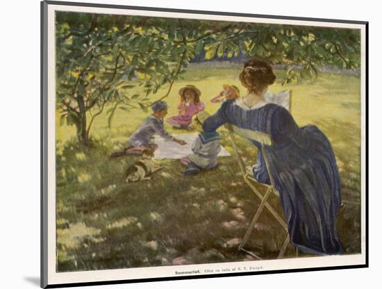 Mama Sits Reading Her Book While the Children and Dog Play at a Tea-Party on the Lawn-null-Mounted Photographic Print