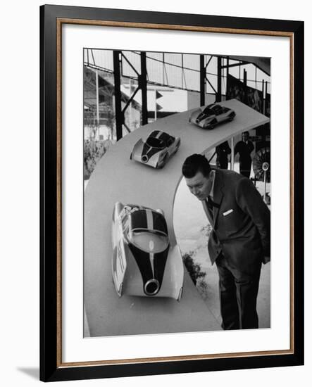 Man Admiring Fiat Automobile Exhibit at the Milan Fair-Ralph Crane-Framed Photographic Print