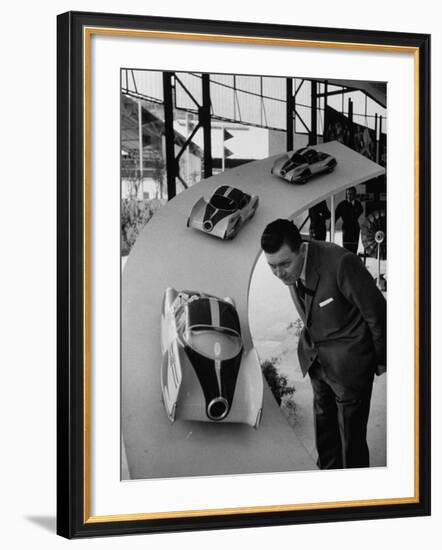 Man Admiring Fiat Automobile Exhibit at the Milan Fair-Ralph Crane-Framed Photographic Print