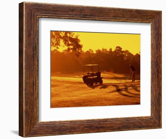 Man and Golf Cart Silhouetted at Sunset-Bill Bachmann-Framed Photographic Print