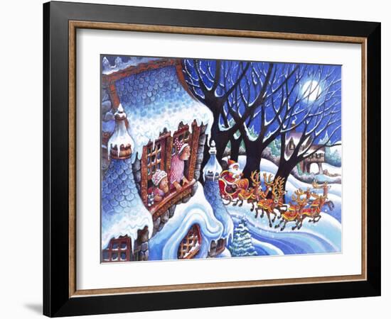 Man and Woman Look at Window at Santa in Sleigh Pulled by Reindeer-Bill Bell-Framed Giclee Print