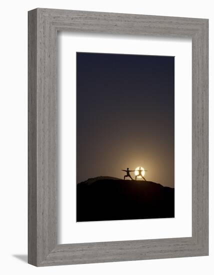 Man and Woman Practice Yoga in Front of a Full Moon in Grand Canyon National Park, Arizona-Louis Arevalo-Framed Photographic Print