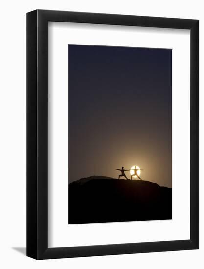 Man and Woman Practice Yoga in Front of a Full Moon in Grand Canyon National Park, Arizona-Louis Arevalo-Framed Photographic Print