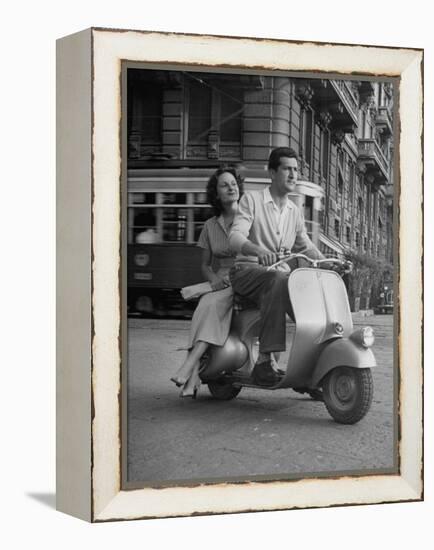 Man and Woman Riding a Vespa Scooter-Dmitri Kessel-Framed Premier Image Canvas