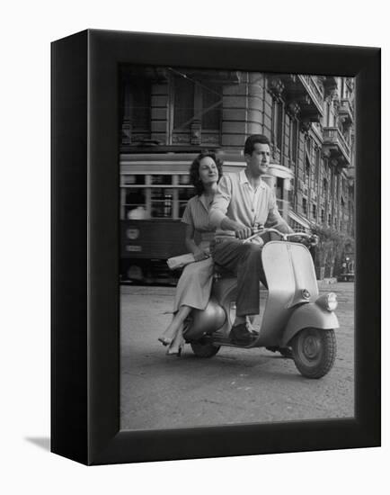 Man and Woman Riding a Vespa Scooter-Dmitri Kessel-Framed Premier Image Canvas