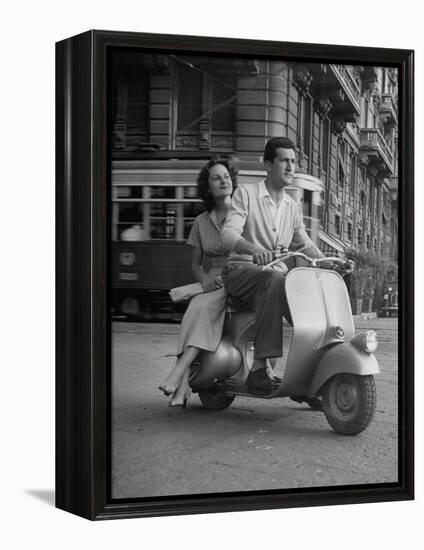 Man and Woman Riding a Vespa Scooter-Dmitri Kessel-Framed Premier Image Canvas