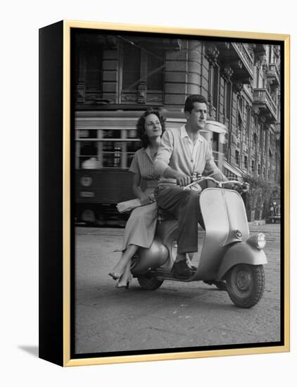 Man and Woman Riding a Vespa Scooter-Dmitri Kessel-Framed Premier Image Canvas