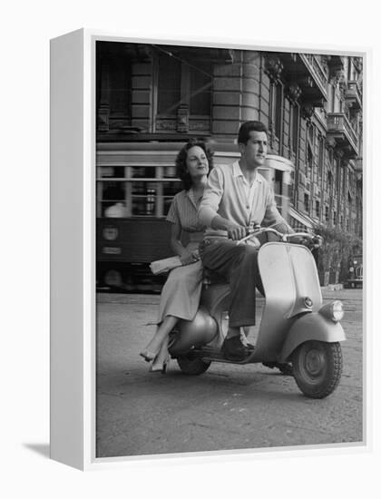 Man and Woman Riding a Vespa Scooter-Dmitri Kessel-Framed Premier Image Canvas