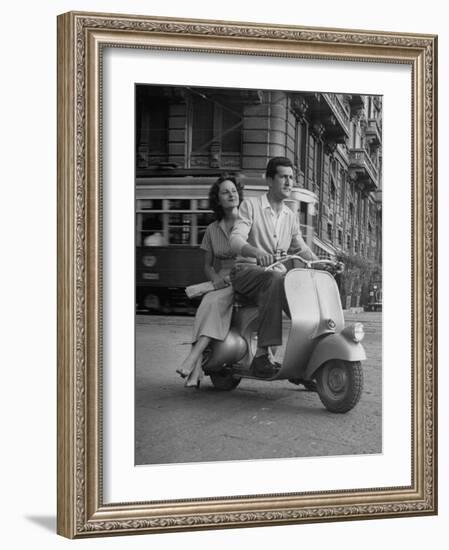 Man and Woman Riding a Vespa Scooter-Dmitri Kessel-Framed Photographic Print